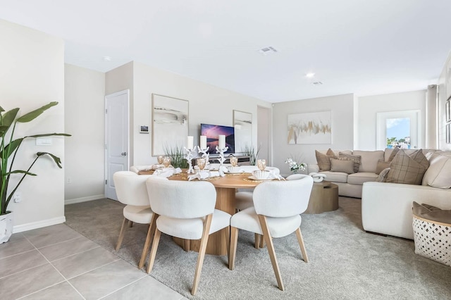 dining room featuring light tile patterned flooring