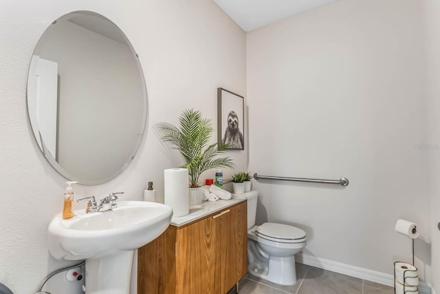 bathroom with tile patterned floors and toilet