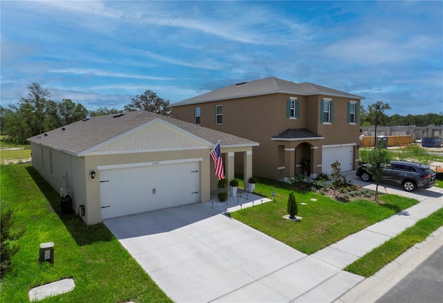 view of front of home featuring a garage and a front yard