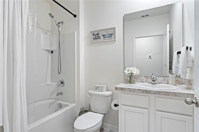 bathroom featuring shower / bath combination with curtain, visible vents, vanity, and toilet