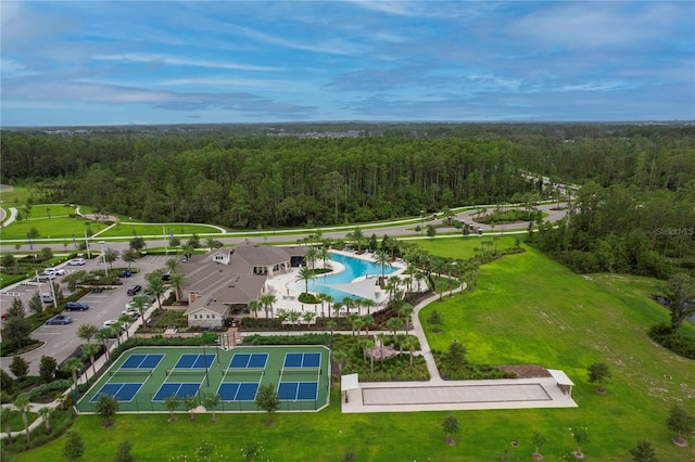 bird's eye view featuring a forest view