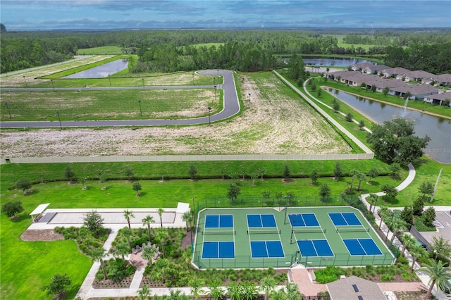 bird's eye view with a water view