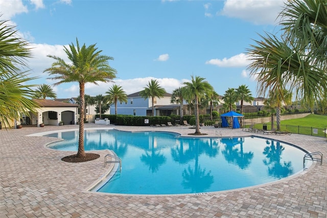 view of pool featuring a patio area