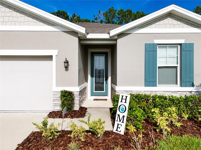 property entrance with a garage