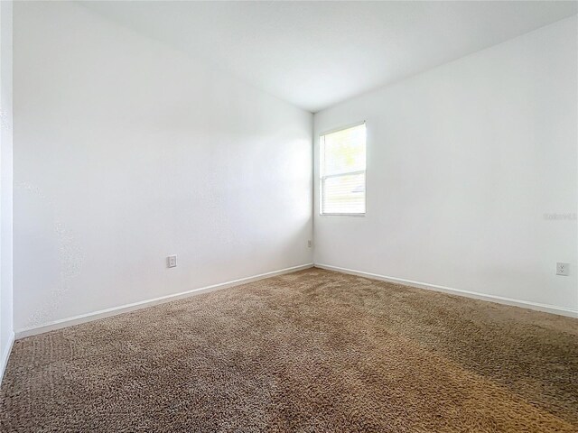 empty room featuring carpet