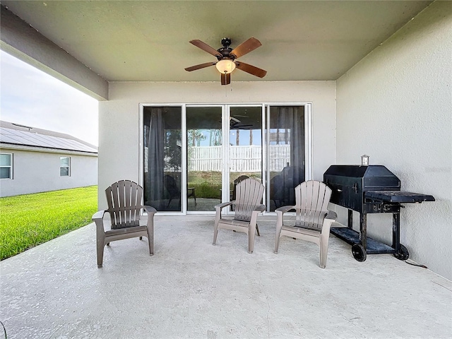 view of patio / terrace featuring ceiling fan