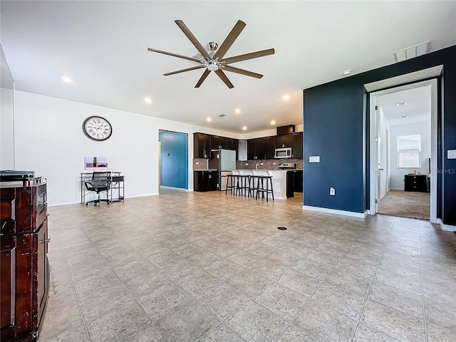 living room with ceiling fan