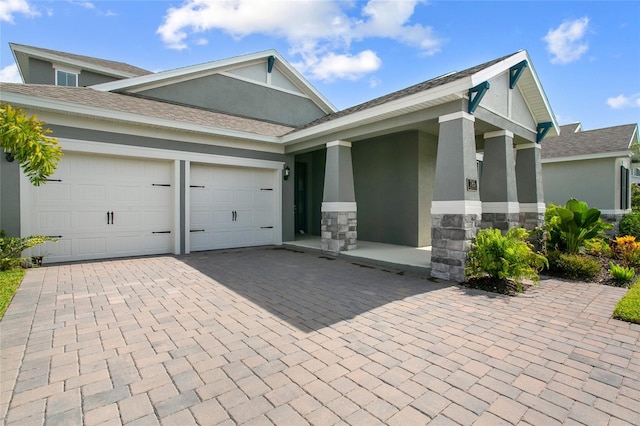 view of front of home with a garage