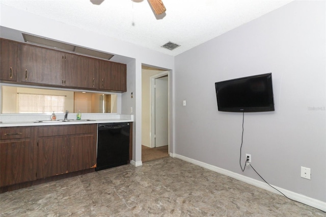 kitchen with dark brown cabinetry, black dishwasher, a ceiling fan, light countertops, and a sink