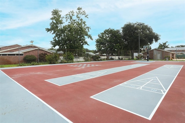 view of home's community with fence