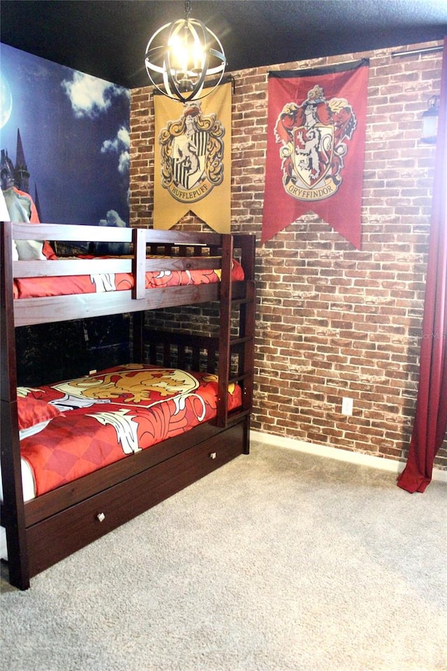 bedroom featuring carpet floors and brick wall