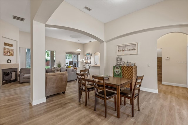 dining space featuring hardwood / wood-style flooring