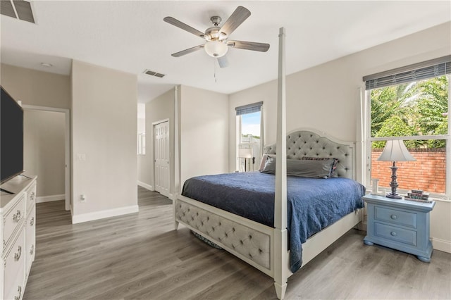 bedroom featuring a closet, ceiling fan, and hardwood / wood-style floors