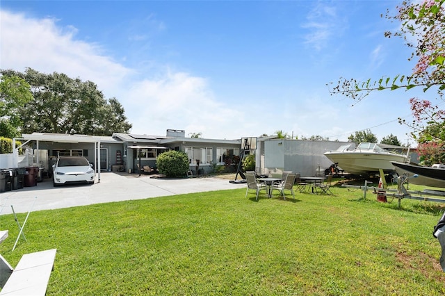 view of yard featuring a carport