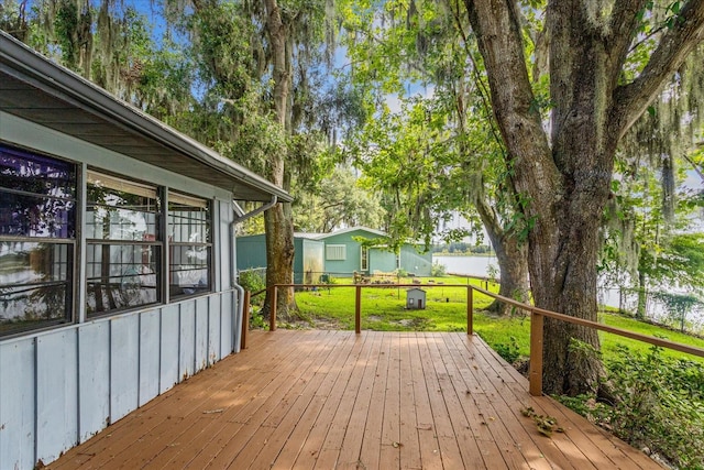 deck featuring a lawn