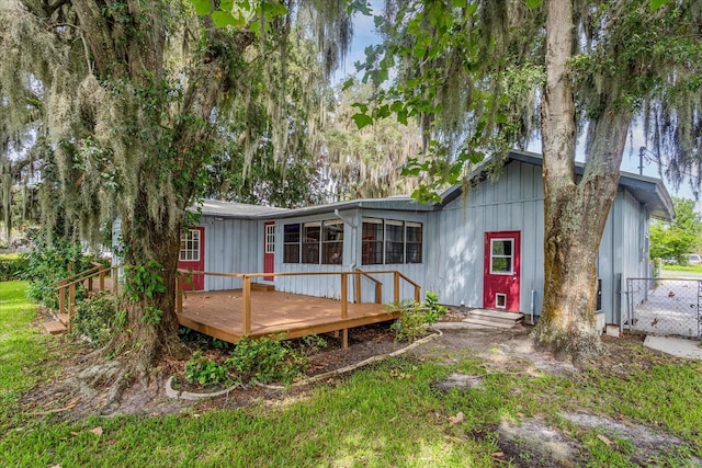 view of front of house featuring a wooden deck