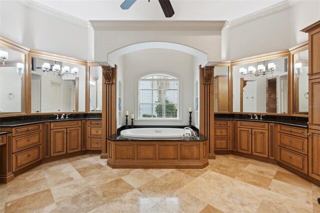 full bathroom featuring ornamental molding, a sink, and a bath