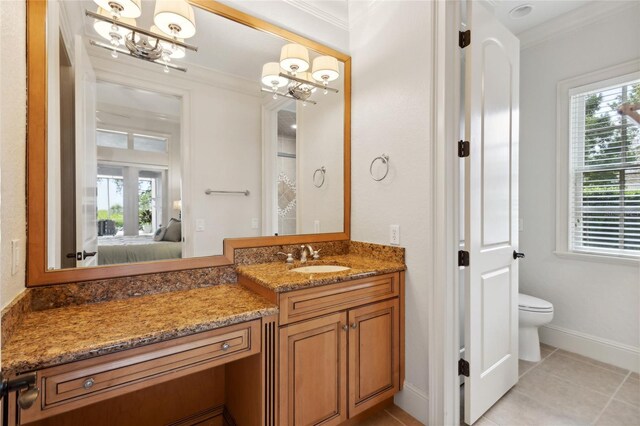 ensuite bathroom featuring ornamental molding, a wealth of natural light, ensuite bath, and tile patterned floors