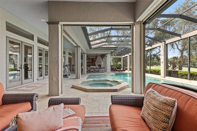 sunroom / solarium featuring a hot tub