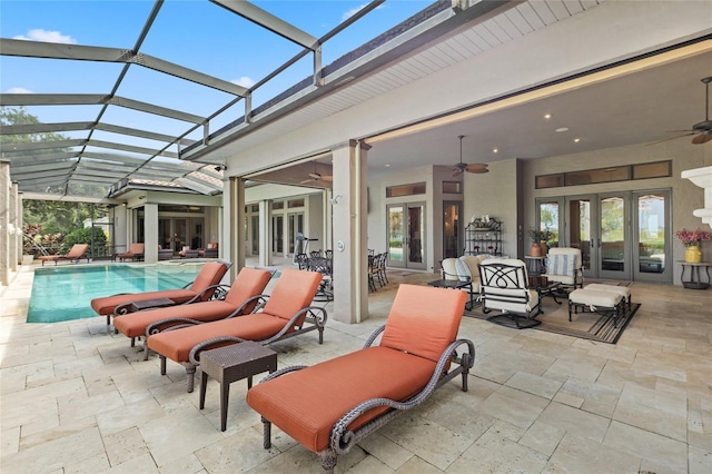 outdoor pool featuring ceiling fan, a patio, and french doors