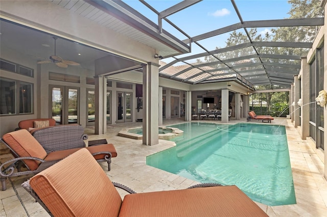 view of swimming pool with a patio area, ceiling fan, outdoor lounge area, and french doors