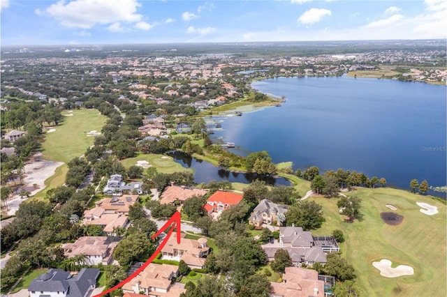 bird's eye view with a water view, view of golf course, and a residential view