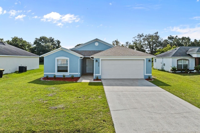 single story home with a garage, central air condition unit, and a front lawn