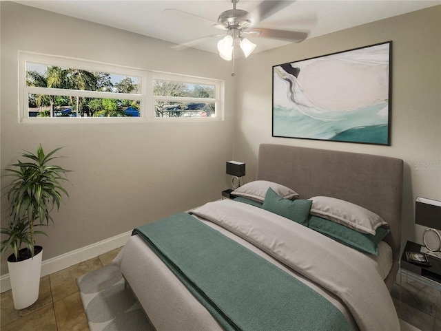 tiled bedroom with ceiling fan