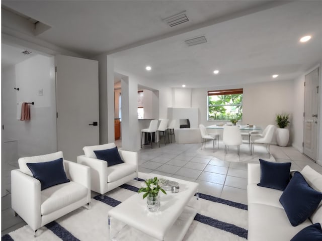 living room with light tile patterned floors