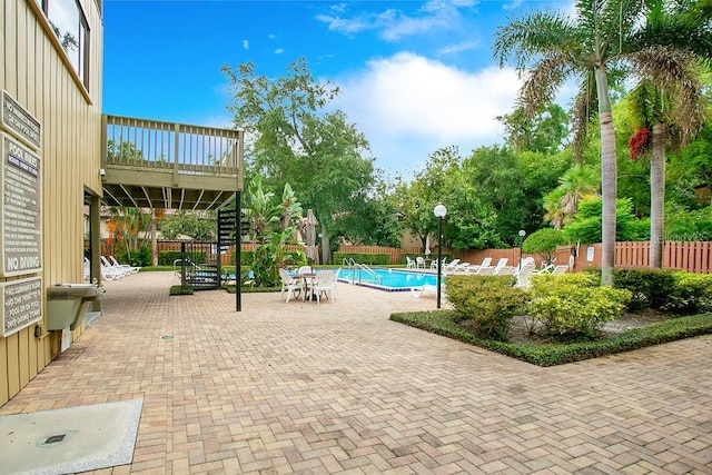 view of pool featuring a patio area