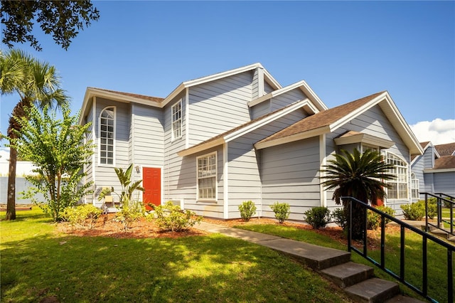 view of front of home with a front yard