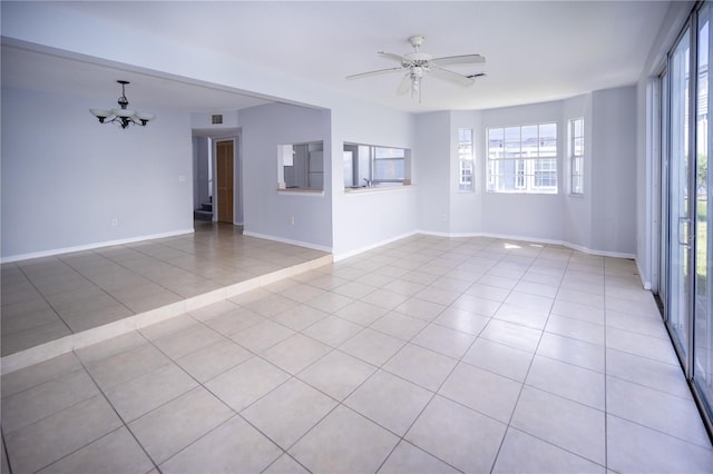 unfurnished room featuring light tile patterned floors and ceiling fan