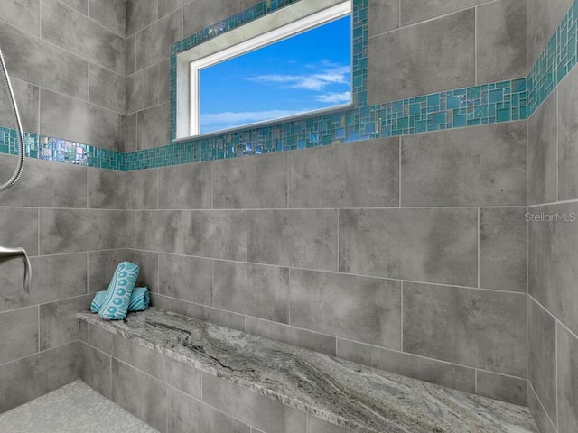 details with a tile shower