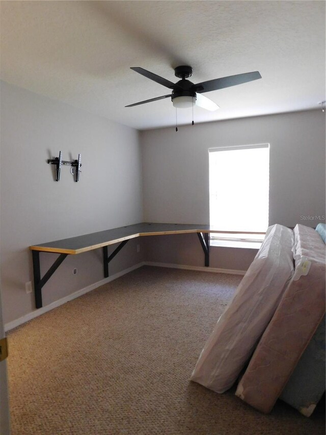 bedroom with carpet flooring and ceiling fan