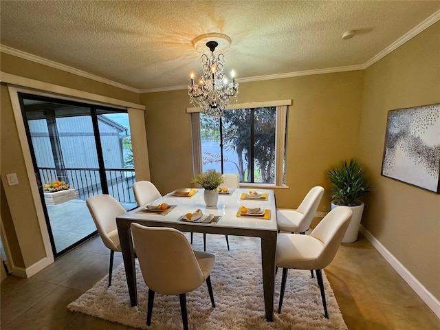 dining space featuring tile patterned floors, ornamental molding, a textured ceiling, and a chandelier