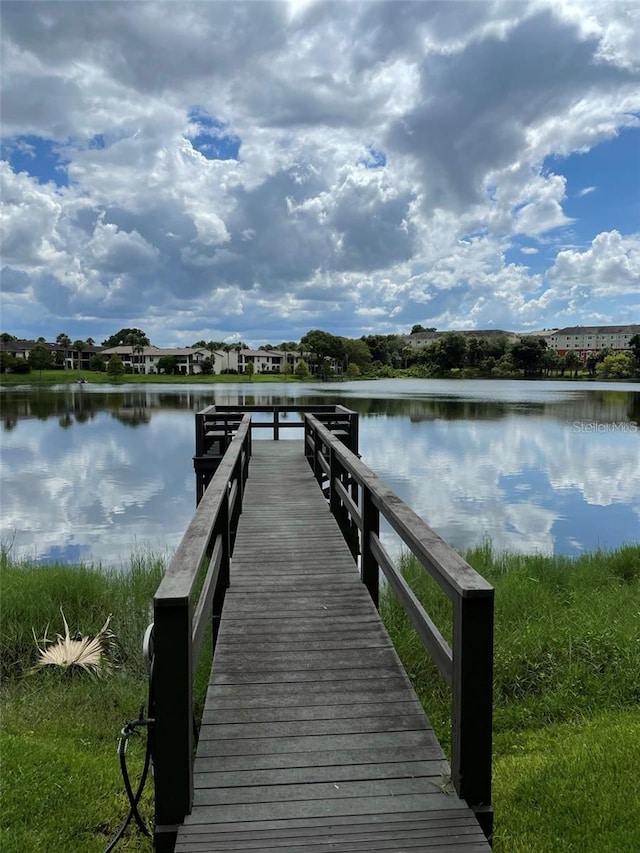 dock area featuring a water view