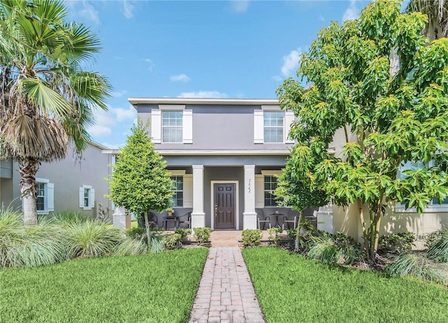 view of front of house with a front lawn