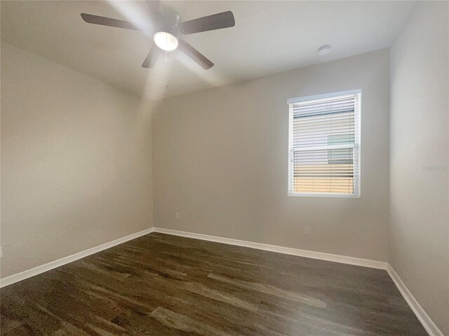 unfurnished room with hardwood / wood-style flooring and ceiling fan