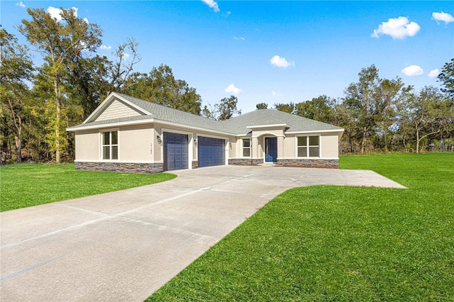 single story home with a garage and a front lawn