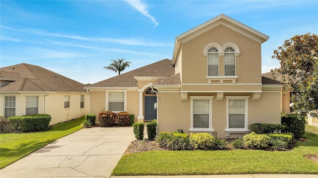 view of front facade featuring a front yard