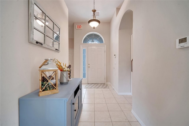 foyer entrance featuring light tile patterned floors