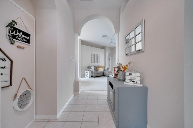 corridor featuring light tile patterned flooring