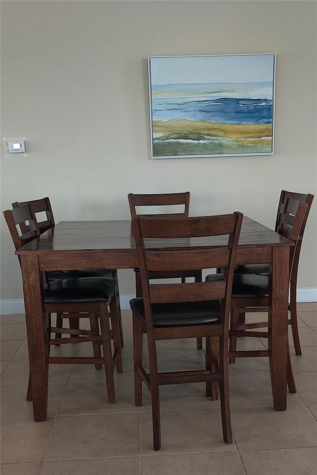 view of tiled dining area