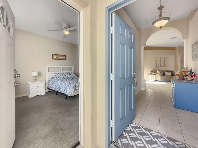 hallway with light tile patterned flooring