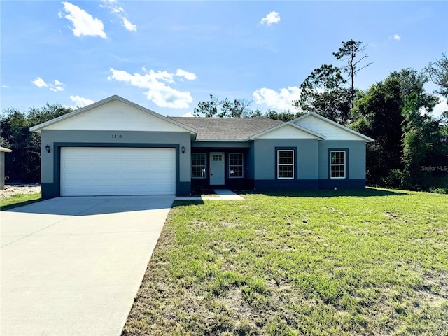 ranch-style house with a garage and a front yard