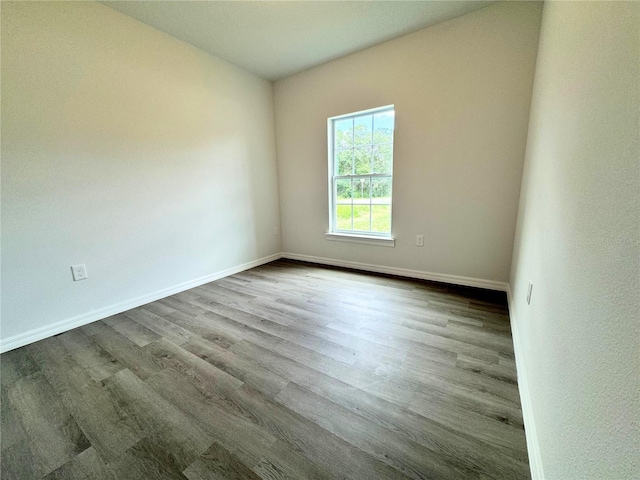 spare room featuring hardwood / wood-style flooring