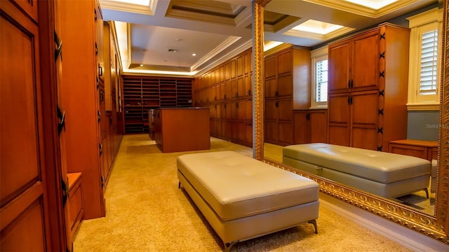 interior space featuring crown molding, coffered ceiling, and light colored carpet