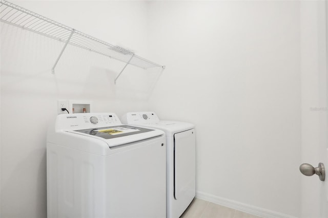 laundry area featuring washer and clothes dryer