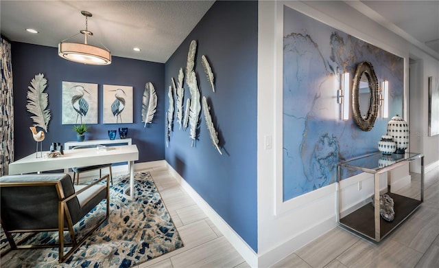 office area featuring recessed lighting, a textured ceiling, and baseboards