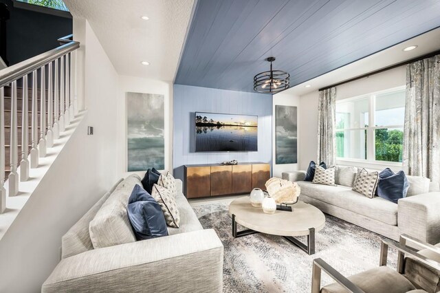 2424 Park Ridge St, Apopka, FL 32712 - living room featuring recessed lighting, a chandelier, stairway, and wood finished floors